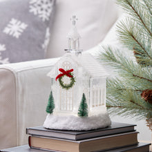 Load image into Gallery viewer, Decorative Christmas lantern with wreath and trees on books, surrounded by snowflakes and pine branches.