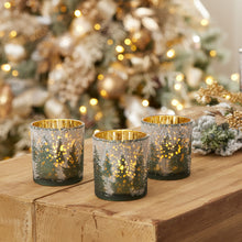 Load image into Gallery viewer, Three frosted pine mercury glass votive holders arranged on a rustic holiday table
