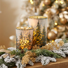 Load image into Gallery viewer, Frosted pine mercury glass candle holders glowing with warm candlelight and decorative pine
