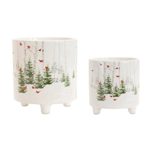Two assorted sizes of winter cardinal dolomite planters, 4.5 and 6 inches tall