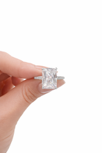 Load image into Gallery viewer, Valentina ring held between fingers against a white background
