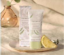 Load image into Gallery viewer, Lifestyle image of Eucalyptus Restorative Hand Cream in bathroom
