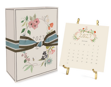 Load image into Gallery viewer, Karen Adams 2027 calendar with gold easel
