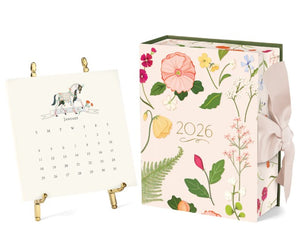 Karen Adams 2026 Desk Calendar with gold easel, custom gift box, and illustrated monthly cards