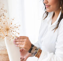 Load image into Gallery viewer, Woman wearing multiple stone wrap bracelets
