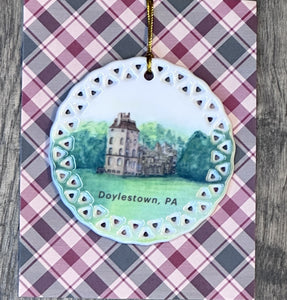 Fonthill Castle Christmas ornament packaged on display card with artist details
Close-up of Fonthill Castle ornament with Bucks County historic landmark watercolor design
Historic Pennsylvania holiday ornament featuring Fonthill Castle watercolor artwork
Artist M. Catherine Bateman’s Fonthill Castle watercolor reproduced on ceramic holiday ornament Castle ornament 