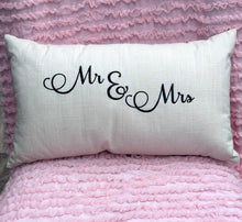 Load image into Gallery viewer, White pillow with 'Mr &amp; Mrs' text on a pink textured background
