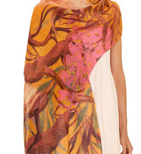Load image into Gallery viewer, &quot;Model wearing oriental crane ochre scarf made from linen and cotton blend, styled as a lightweight wrap&quot;
