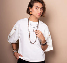 Load image into Gallery viewer, Woman wearing stone wrap as necklace and bracelets
