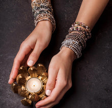 Load image into Gallery viewer, Close-up of semi-precious tourmaline beads with gold accents
