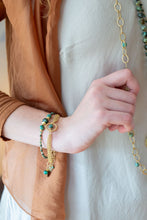 Load image into Gallery viewer, Matte gold bracelet with African turquoise circle focal and woven detail
